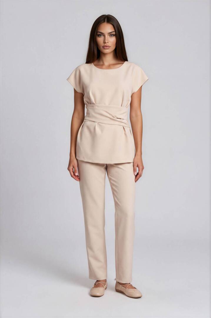 luxury spa set uniform Sienna Relax Wrap Belt Set in beige featuring a relaxed spa tunic with dropped sleeves, integrated wrap belt tied at the back, and straight-leg trousers for luxury spa and beauty professionals.