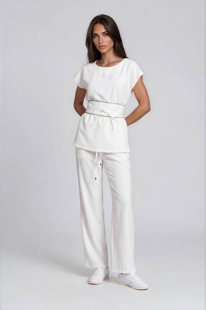 IMG_9221-Emmi-Light Studio-4 Wide wrap belt with contrasting brown piping creating a refined waistline.