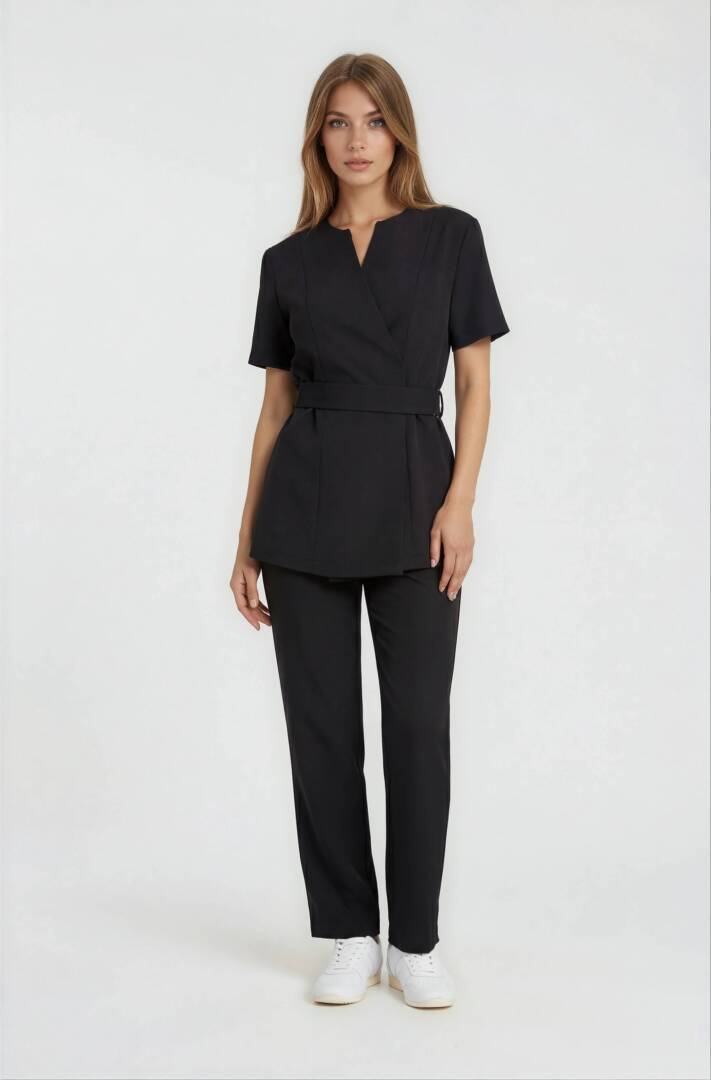IMG_5891-IMG_5893-women footwear 2_front-Sophia-Light Studio-2 Black luxury spa uniform with wrap tunic and gold buckle belt.