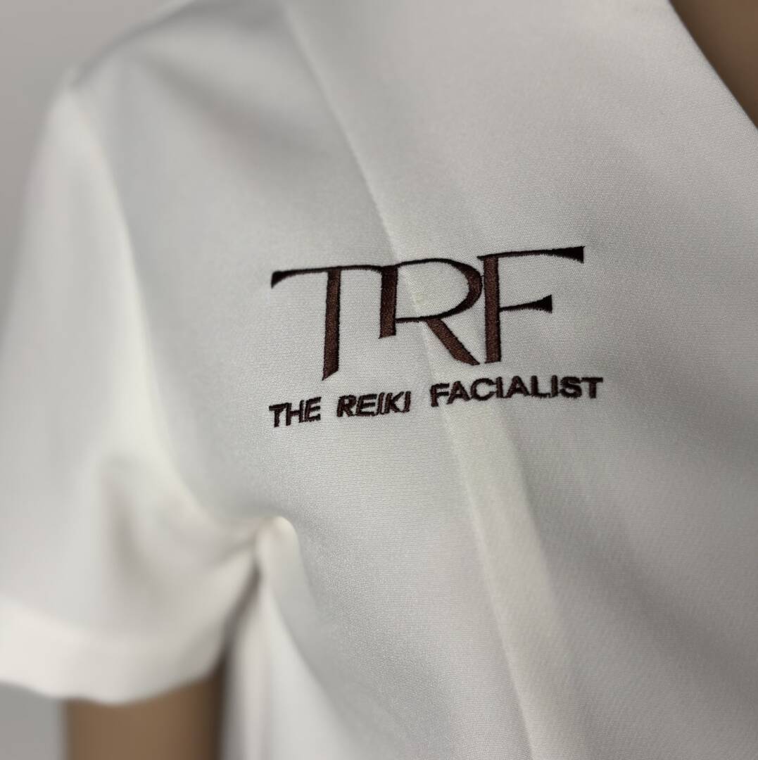 IMG_6414 Custom logo embroidery on Monaco Natural White professional spa tunic