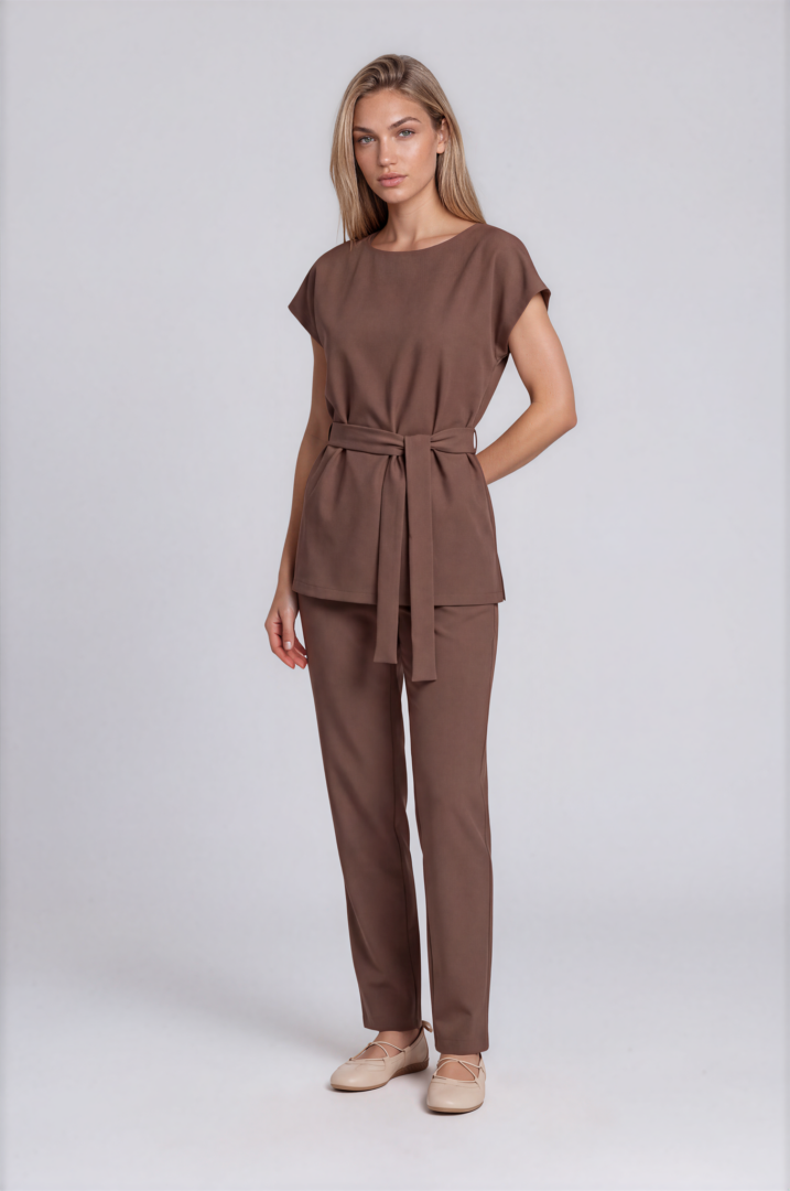 mocha brown set with belt-Drew-Light Studio Side view of Sienna Mocha Brown spa uniform showing the relaxed tunic silhouette and side slits.