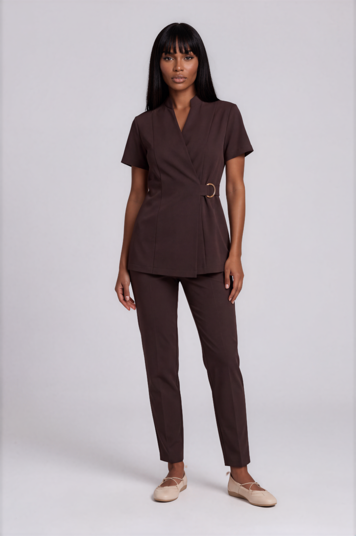 espresso brown set with ring Close-up of the gold-tone ring closure on the Monaco Espresso Brown luxury esthetician tunic.